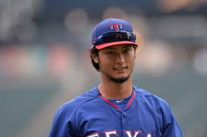 CHICAGO, IL - AUGUST 4:  Yu Darvish #11 of the Texas Rangers stands on the field during batting practice before the game against the Chicago White Sox at U.S. Cellular Field on August 4, 2014 in Chicago, Illinois. The White Sox defeated the Ranger 5-3 in a rain-shortened game.  (Photo by Brian D. Kersey/Getty Images)